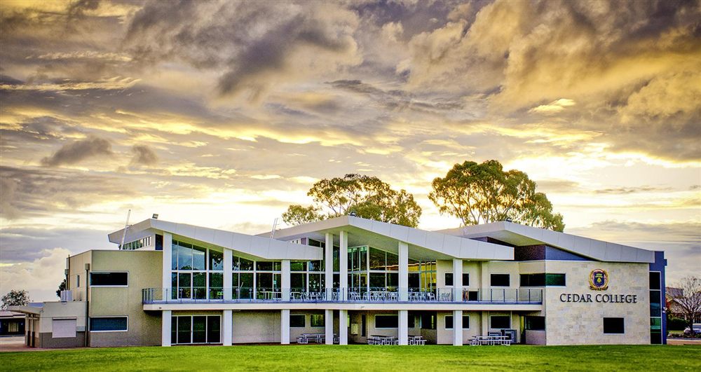 Cedar College building at sunset